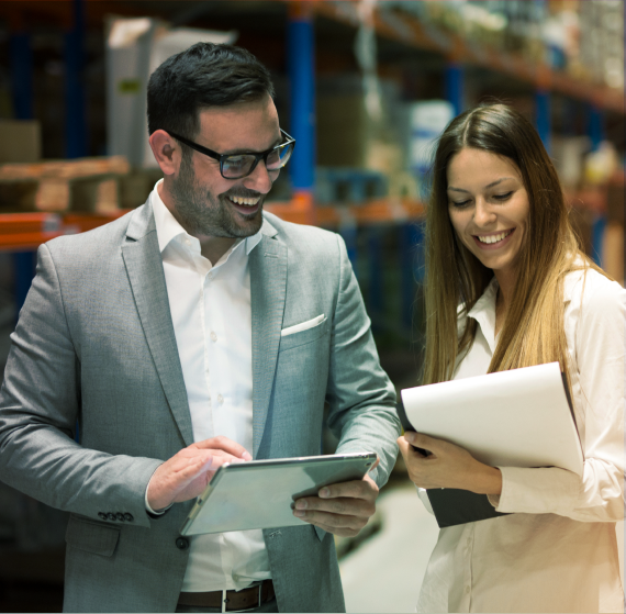 Managers reviewing inventory in a storage center